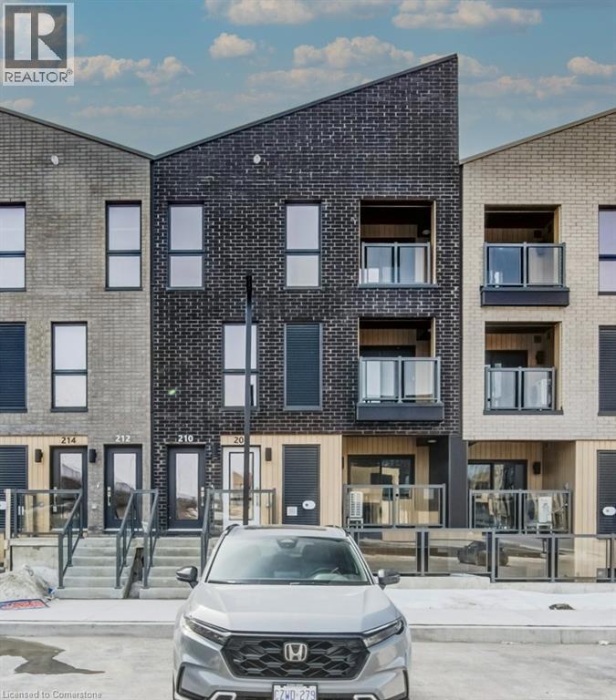 208 SERENE Way Unit# H065=View of building exterior