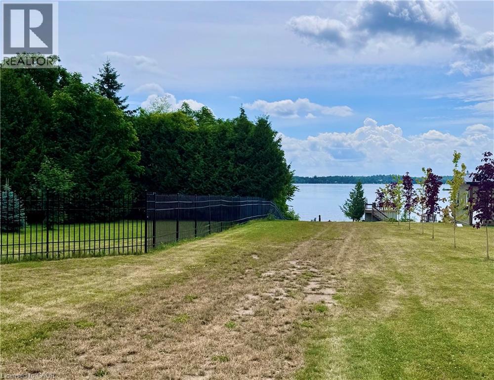 31 BLUE BAY Lane=View of yard with a water view