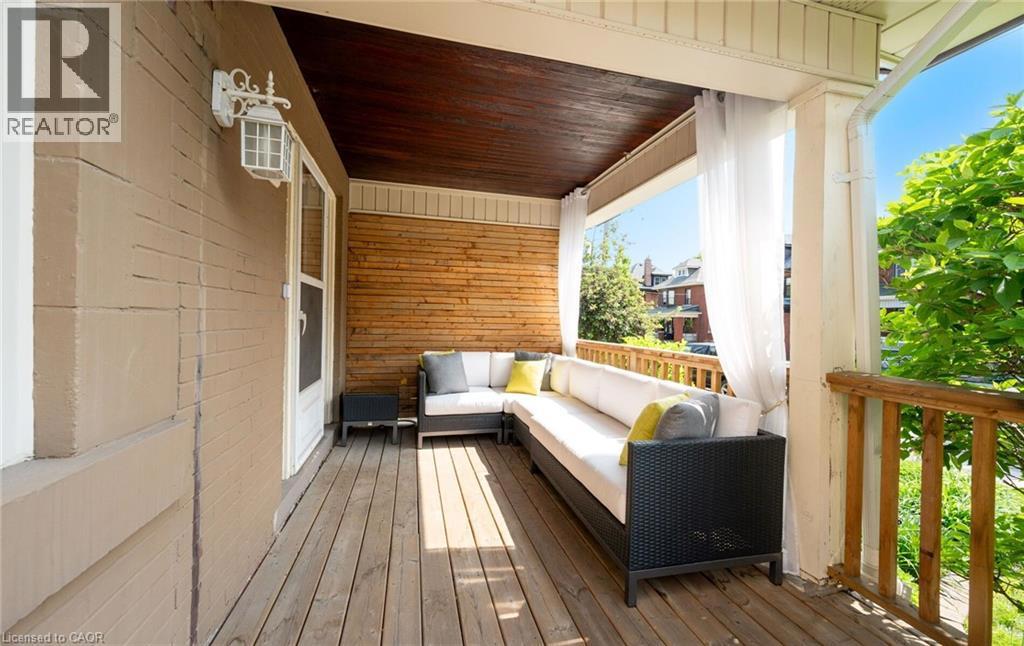 124 EASTBOURNE Avenue=Wooden terrace featuring an outdoor hangout area