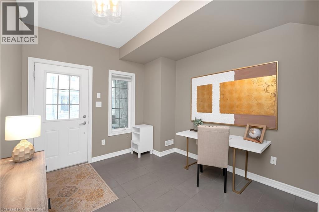 215 DUNDAS Street E Unit# 29=Tiled foyer featuring baseboards