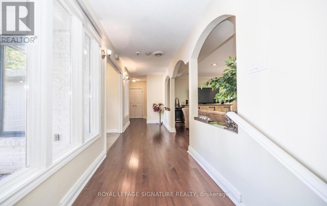 2098 PHARMACY AVENUE=Gleaming Hardwood Flooring Throughout Main Level!