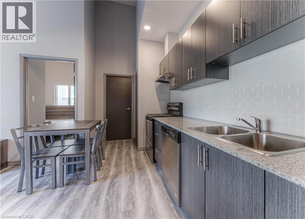 275 LARCH Street Unit# F113=Double Sink with Contemporary Cabinetry and Subway Tile Backsplash