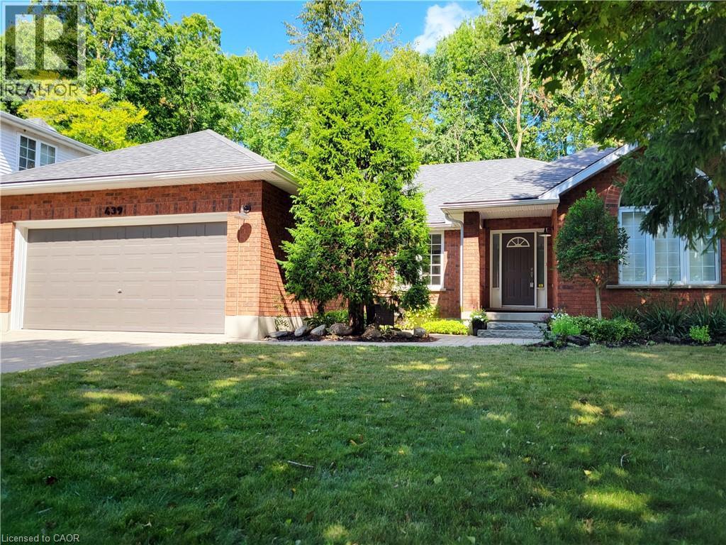 439 NORTHLAKE Drive=Ranch-style home with a front lawn, brick siding, a garage, roof with shingles, and concrete driveway